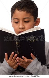 stock-photo-child-reading-the-bible-70445761